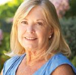 Headshot of a senior woman smiling