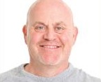 Headshot of senior man smiling